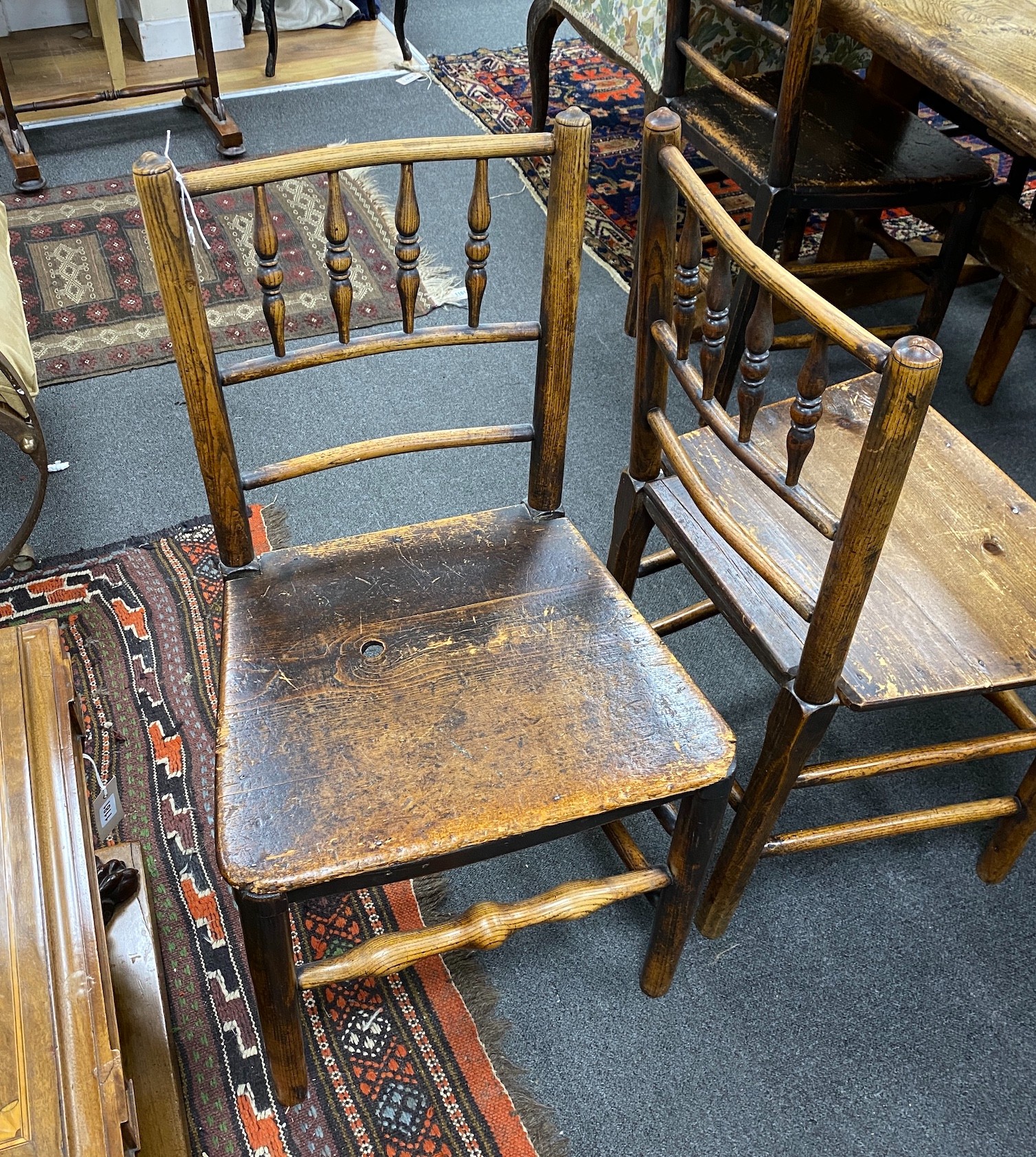 A set of six early 19th century provincial ash and elm wood seat dining chairs